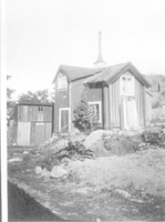 Gammalt trähus utmed Östra Bergsgatan, 1915.