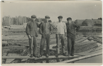 Porträtt på fyra arbetare