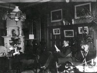 Interiör med läsande man, 1880-tal