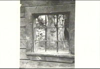 Fönster i en byggnad vid gatan (rivet)
