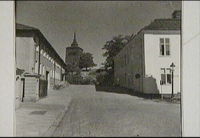 Från Stora Torget. (Utsikt mot Västra Klockstapeln.) Bergsgatan